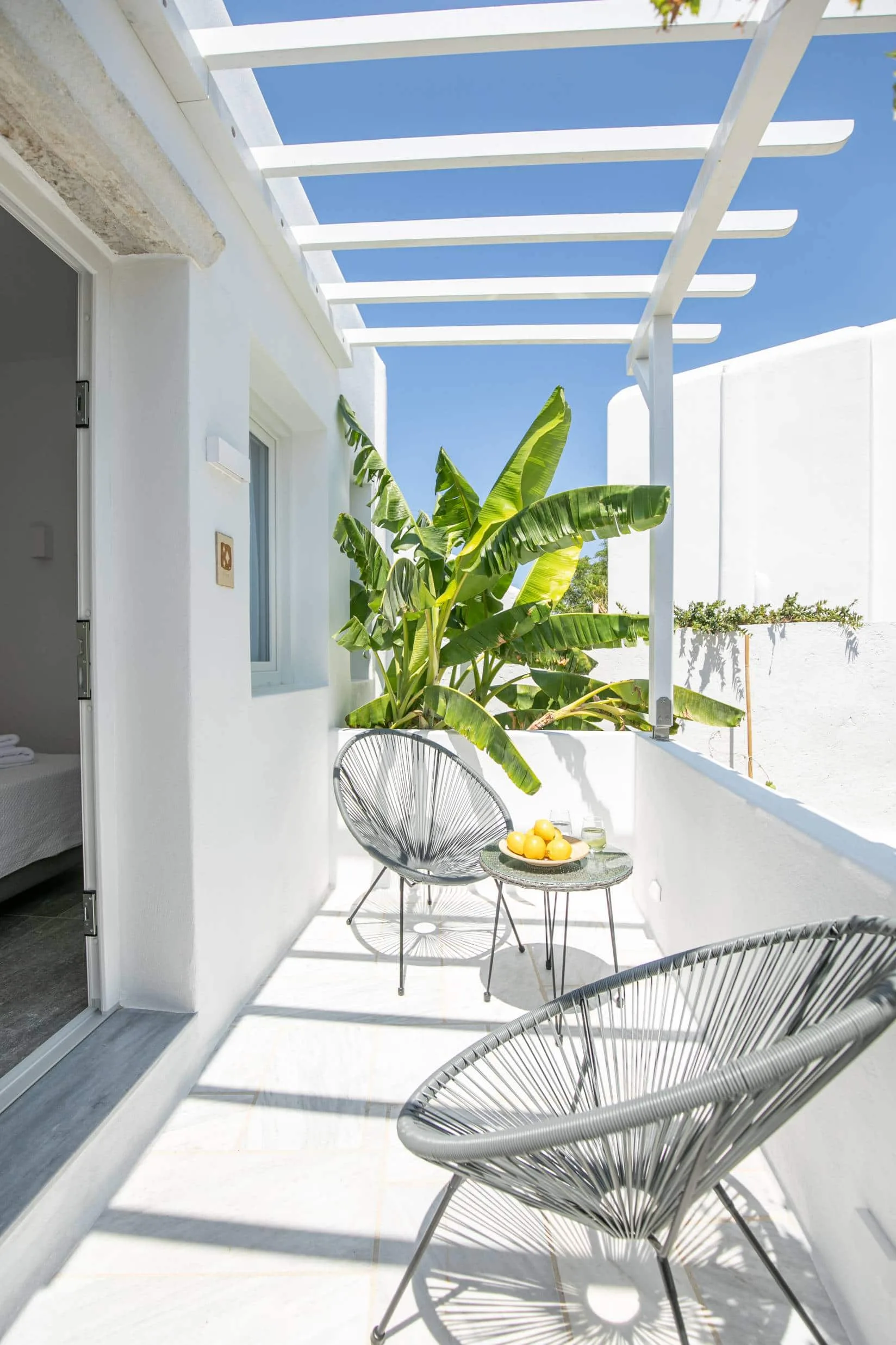 Covered terrace with pergola outside a suite